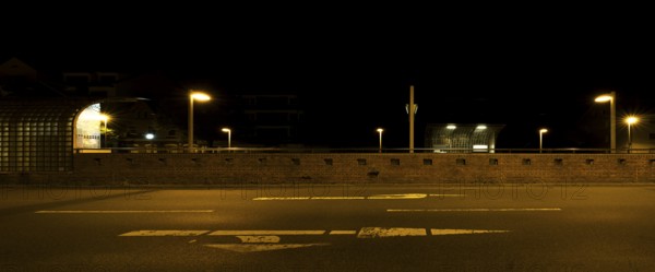 View across the street to the city railway station Stadtfriedhof Stöcken at night, Stöcken,