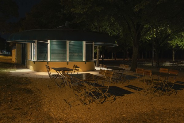 Night shot of a closed kiosk with seating in the Herrenhausen Gardens, Herrenhausen, Hanover, Lower