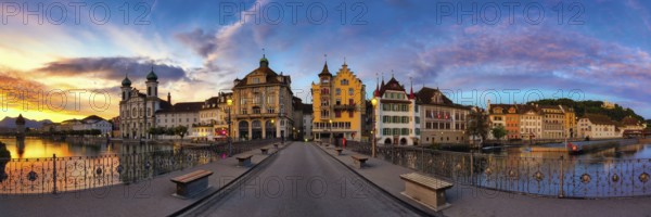 Panorama from the Reuss Bridge to Lucerne's Old Town with Jesuit Church at dawn, Canton of Lucerne,
