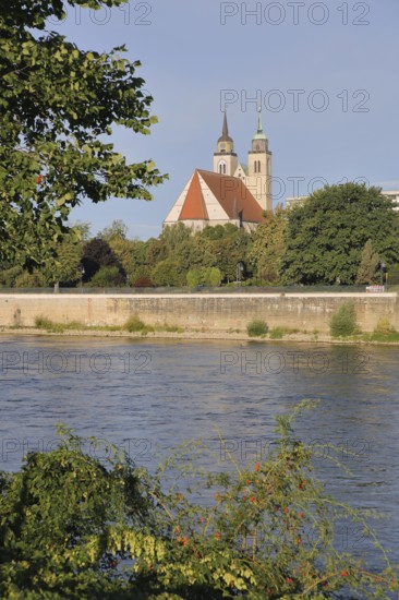 Late Romanesque St John's Church with twin towers and Elbe, Elbe riverbank, Magdeburg,