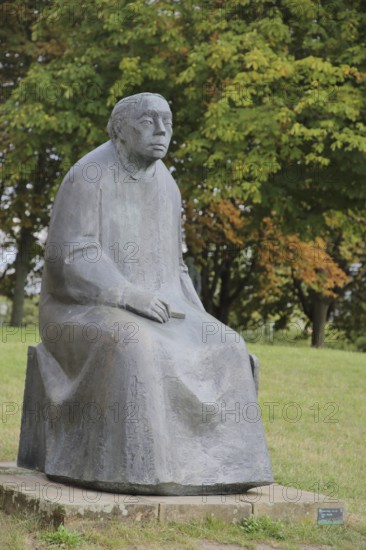 Sculpture Käthe Kollwitz by Gustav Seitz 2010, monument to the paintress, sculptor, seated female
