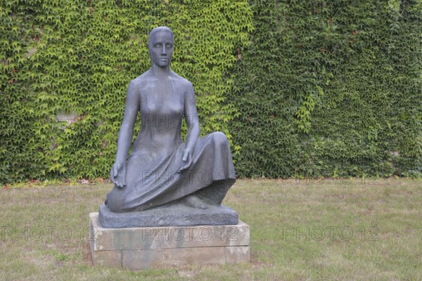Sculpture Mother Earth by Fritz Cremer 1951, seated female figure, bronze sculpture, life-size,