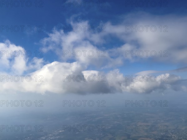 Aerial view of altocumulus clouds in the centre top centre cirrocumulus clouds cluster clouds, top