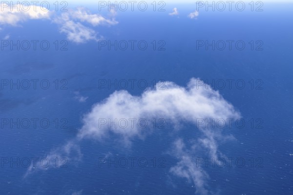 View from aeroplane of white bright cumulus clouds Cirrocumulus clouds Cirrocumulus at high