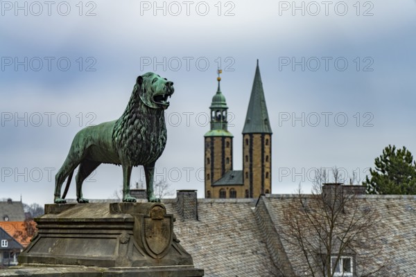Brunswick Lion of the Imperial Palace and the towers of the Market Church of St Cosmas and Damian