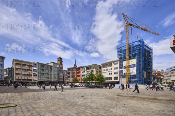 Square, construction site, scaffolding, crane, general architecture, paving slabs, pedestrians as