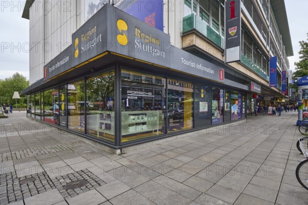 Tourist information centre, building, shop window, pavement made of paving slabs, pedestrian zone,