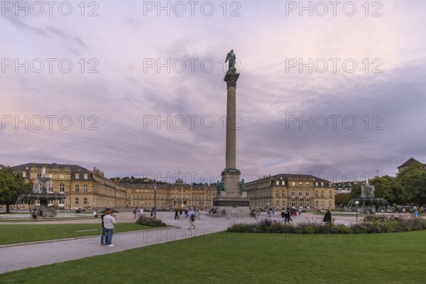 Evening atmosphere at Schlossplatz Stuttgart. View of the New Palace and Jubilee Column. Stuttgart,
