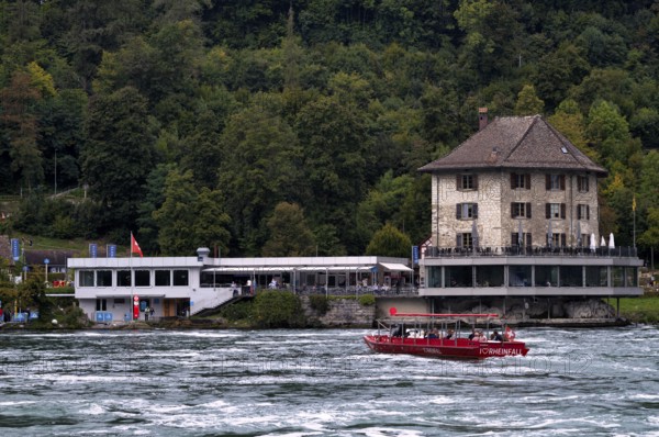 Excursion boat with tourists, Rhine Falls Schaffhausen, waterfall, Panoramarestaurant Schlössli