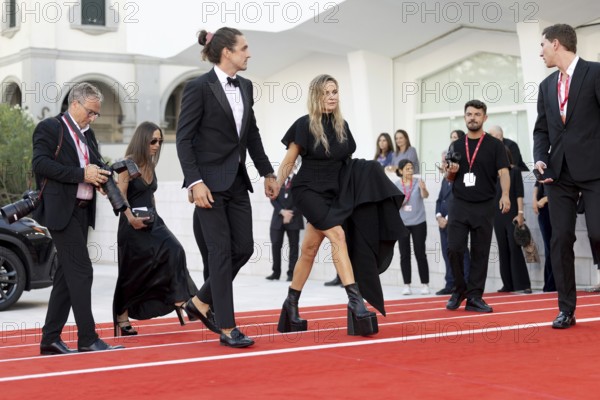 Venice, Italy - 2 September 2025: Rory St. Clair Gainer, Rebecca Ferguson during the Red Carpet of