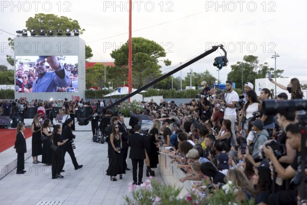 Venice, Italy - 2 September 2025: Fans during the red carpet of - A house of Dynamite - during the