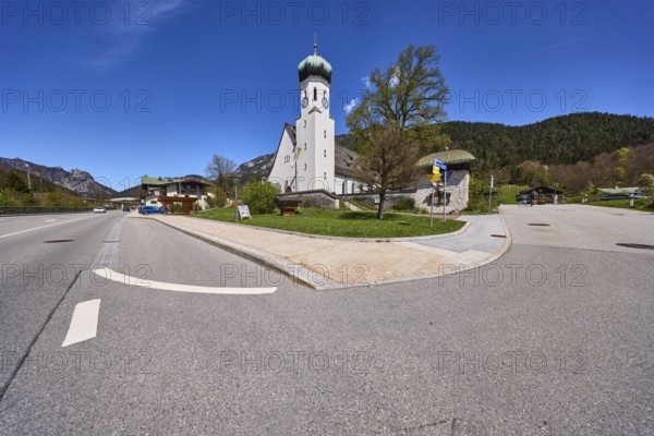 Parish church Herz-Jesu Bischofswiesen, church, trees, lawn, hill, coniferous forest, blue sky,