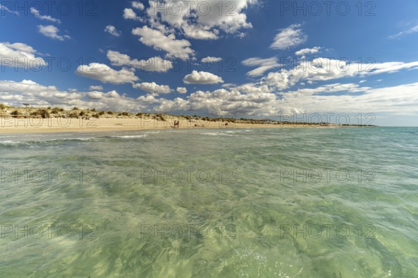 Crystal-clear turquoise water on the beach at Torre San Giovanni, Marina di Ugento, Apulia, Italy