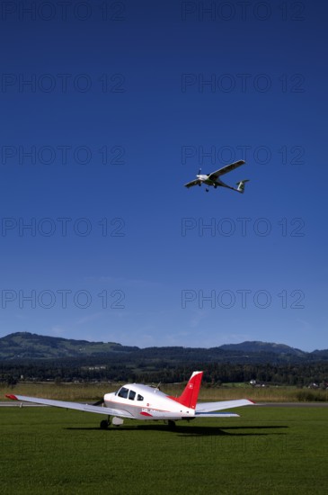 Pipistrel Velis Club with aircraft registration HB-NPP taking off over Piper Archer II HB-PPY on