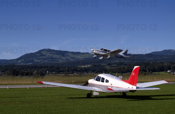 PA28 Archer II 180 HP identification aircraft registration HB-PMG during take-off over Piper Archer