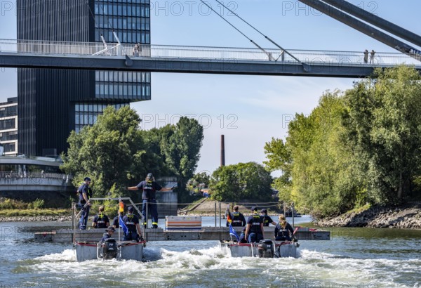 Exercise run of a multi-purpose pontoon on the Rhine, Medienhafen, the skipper gives instructions