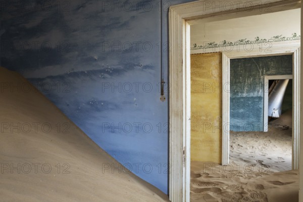 At Kolmanskop, the abandoned ghost town of the diamond days of the early 1900 and of German origin.