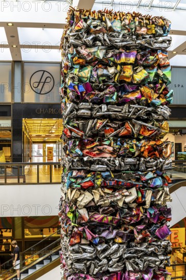 Interior design, artwork made from compressed scrap cars, partially vacant Shopping Quartier 205 in