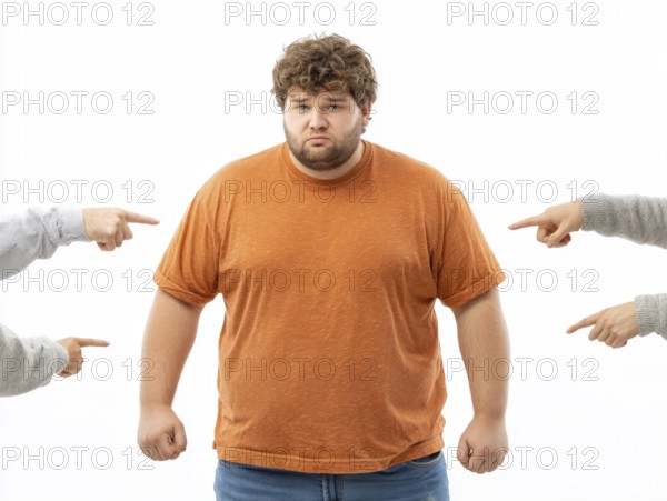 Overweight boy being judged by pointing fingers, symbolising fatshaming, bullying, judgement and