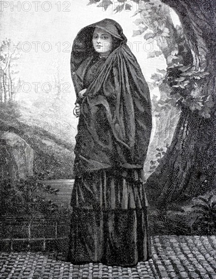 Woman from Malta with a Ghonnella, also called Faldetta, form of headgear and scarf or hooded cloak