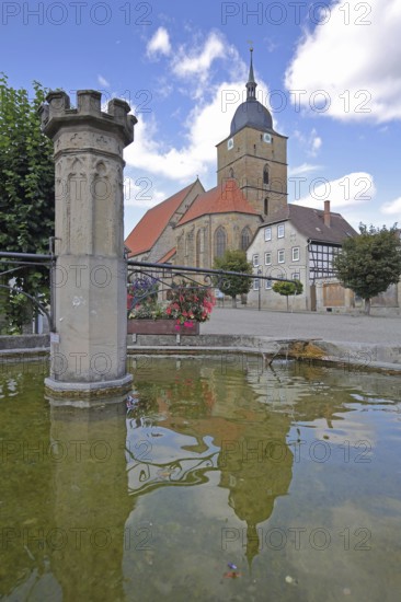 Market fountain and town church of Our Lady built 16th century, water basin, reflection, market,