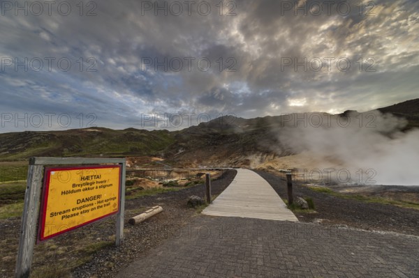 Hot springs, geothermal field, danger sign, cloudy, evening mood, backlight, summer, Krysuvik,