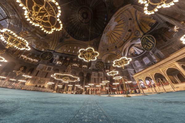 Wide angle view of the interior of hagia sophia in istanbul, turkey, showcasing its magnificent