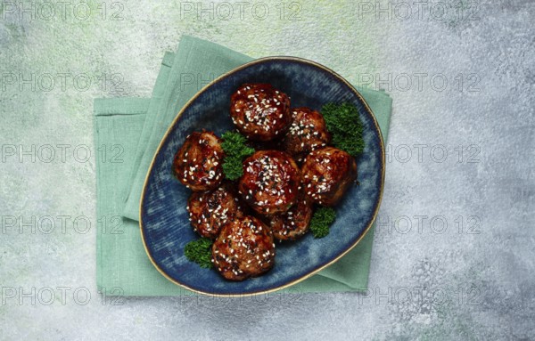 Tsukune, Japanese meatballs, minced chicken, fried on a skewer, with yakitori sauce, homemade, no