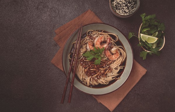 Soba, buckwheat noodles, with shimeji mushrooms and tiger shrimps, sesame, lime, parsley, homemade,
