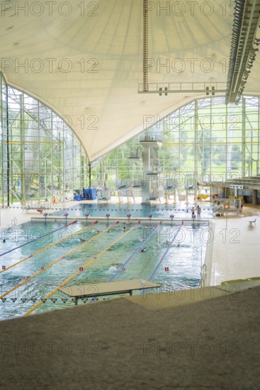 Spacious indoor swimming pool with large window fronts that let in plenty of light, Olympiapark,