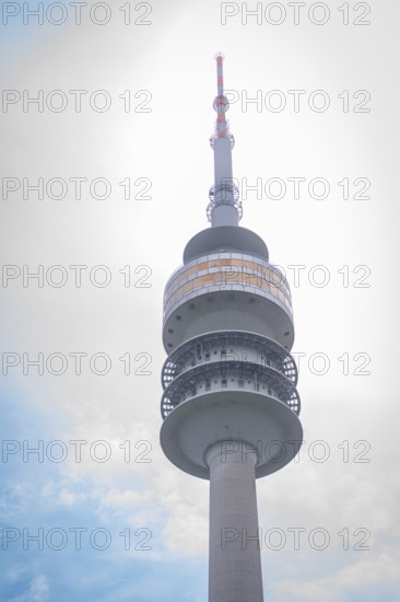 Architecturally striking television tower with spiral structure in front of a cloudy sky, Olympic