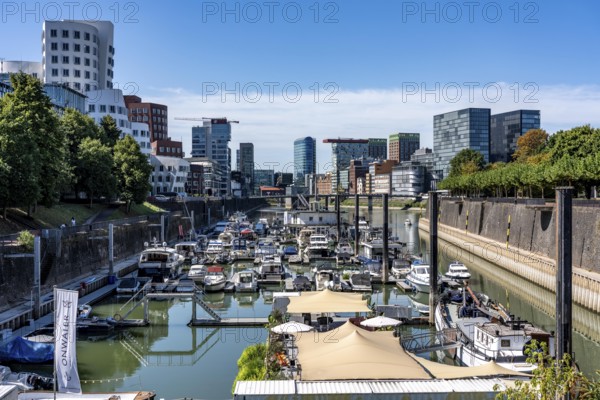 Marina in Düsseldorf's Media Harbour, old and modern architecture in the former harbour, a mixture