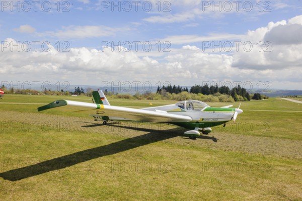 Motor glider of type Scheibe SF.25C Falke is parked at Wasserkuppe airfield, Wasserkuppe airfield,
