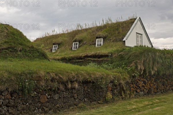 Grass sod house settlement Grenjadarstadur with church, Thingeyjarsveit municipality, North