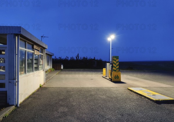 Petrol station vending machine with self-service day and night in rural surroundings in the