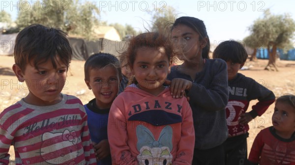 A group of Syrian refugee children gathered inside a camp. Aleppo, Syria. October 29, 2022, Aleppo,