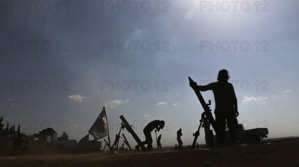 Syrian opposition forces firing mortar shells at ISIS gathering points in northern Syria. Aleppo,