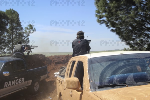 Vehicles and heavy weapons used by Syrian opposition fighters in combat against ISIS. Aleppo, Syria