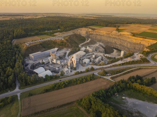 Large quarry and industrial area in a rural setting in the evening, industrial area Wolfsberg