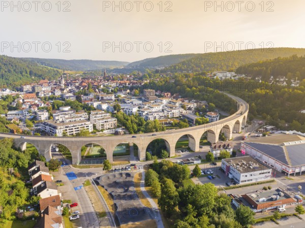Large viaduct in a town, framed by hills and evening atmosphere, Nagold, district of Calw, Black