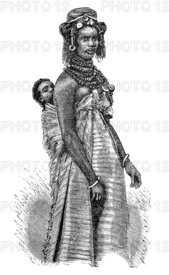 A woman with a baby on her back from the Pöth tribe, Fulani, also known as Fula or Peul, large