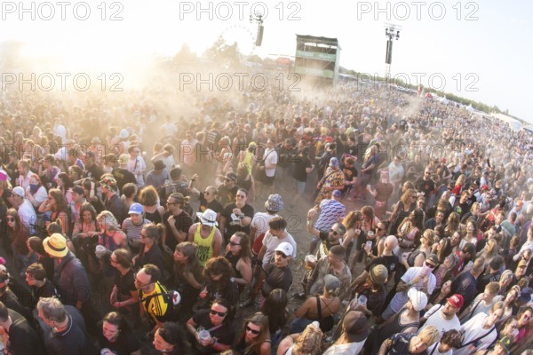 Festival visitors during a mosh pit at the Highfield Festival on Saturday, Störmthaler See,