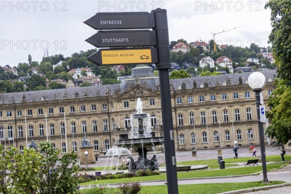 Digital signpost in front of the New Palace on Schlossplatz in Stuttgart. Regularly changing LED