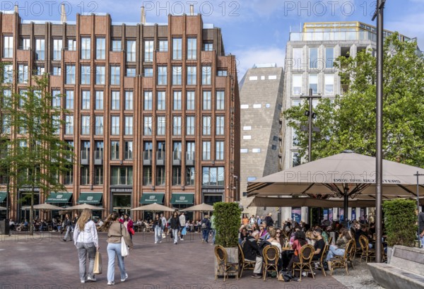 The Grote Markt in the old town of Groningen, modern facades of hotel and commercial buildings, in