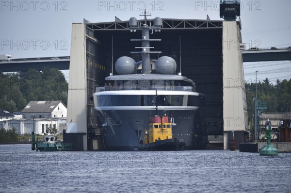The new superyacht COSMOS leaves the Lürssen shipyard near Rendsburg for the Kiel Canal, Kielkanal,