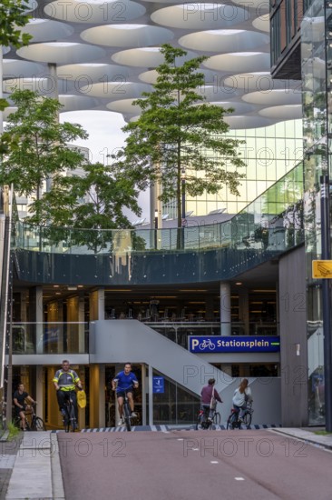 Entrance and exit to the central bicycle car park at Stationsplein, the largest bicycle car park in