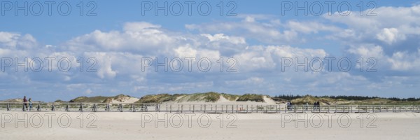 Wooden walkway on sandy beach, dunes, cloudy, panoramic format, Sankt Peter Ording, Eiderstedt,
