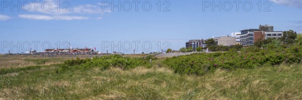 Restaurant and hotel on the promenade, dune landscape, panorama format, Sankt Peter Ording,
