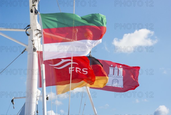 Flag of Heligoland, flag of the shipping company FRS, German flag and Hamburg state flag, flags,