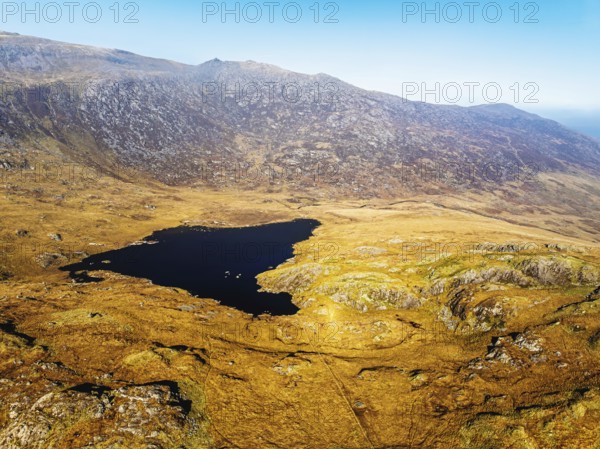 Autumn colours over Llyn Cwmffynnon and Miner's Track, Start Point, road A4086 from a drone,